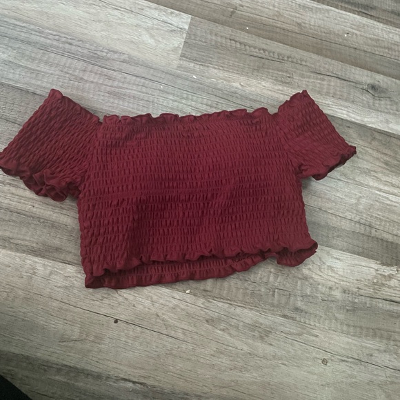 Selling a off the shoulders, burgundy swim top. Size M in kids I believe. - Picture 1 of 3